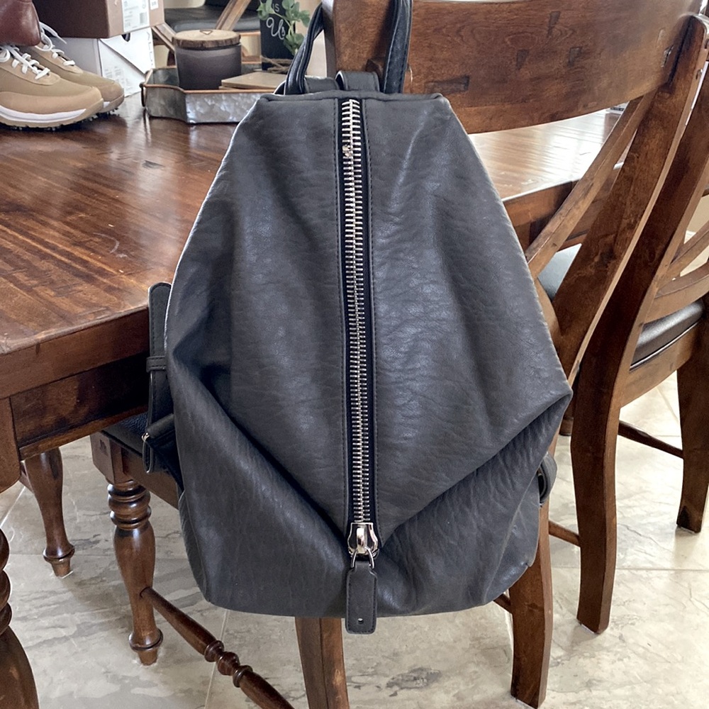 Grey leather backpack